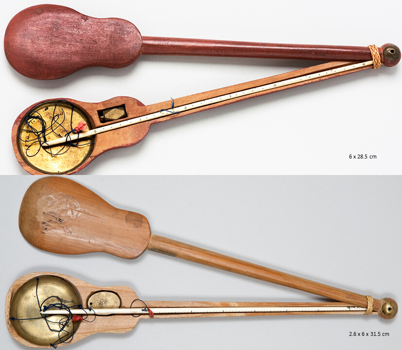 Violin-shaped cases of transparently urushi-coated wood and bamboo for steelyard balances made of yellow metal plates, bone scales, metal sliding counterweights, and silk yarn and suspension strings.