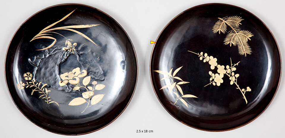 Round and shallow vessels for eating or drinking, decorated with floral design in gold togidashi makie. The sample position for analyses is marked with a yellow triangle and red arrow.